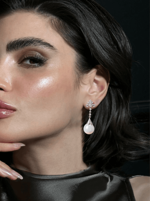 Model Wearing Perlina Pearl Dangle Earrings in Rhodium Plated Metal Jewelry for Pierced Ears Post / Pin & Push 925 Sterling Silver Stamp Marked Copper Stone One Size 11.6gms
