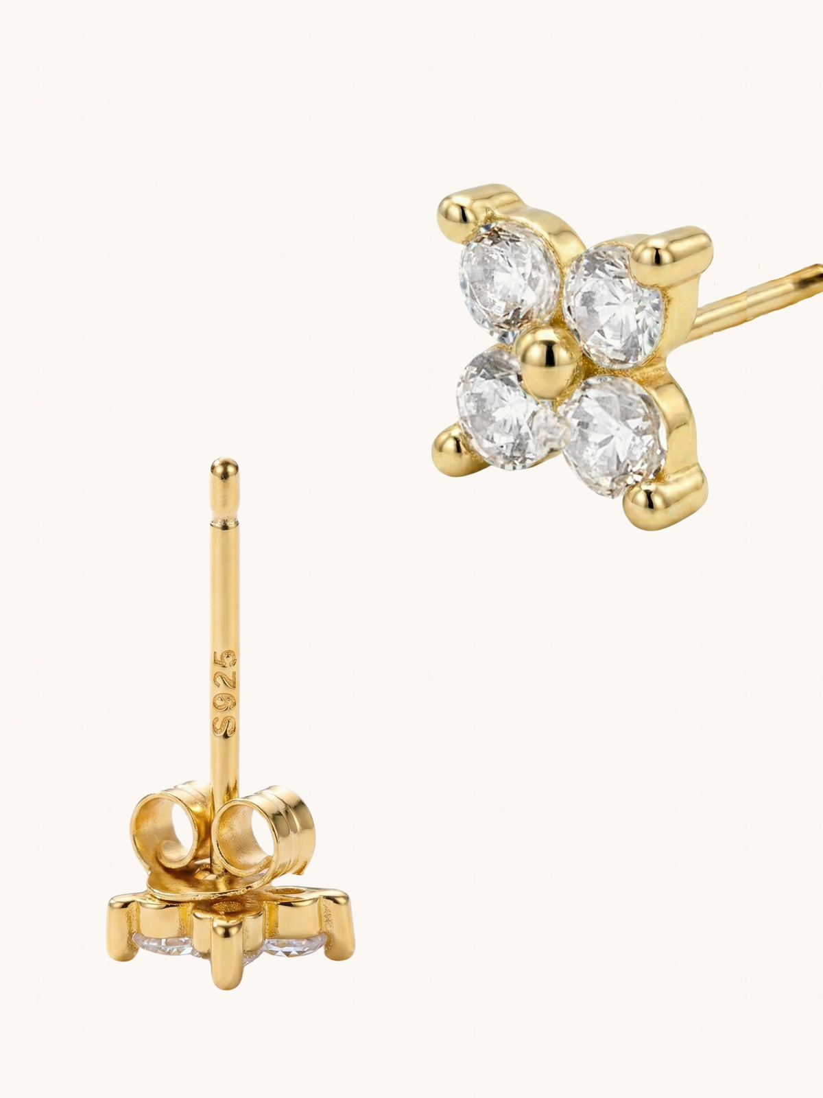 Angled view of a gold Irene star stud showing the post and push back
