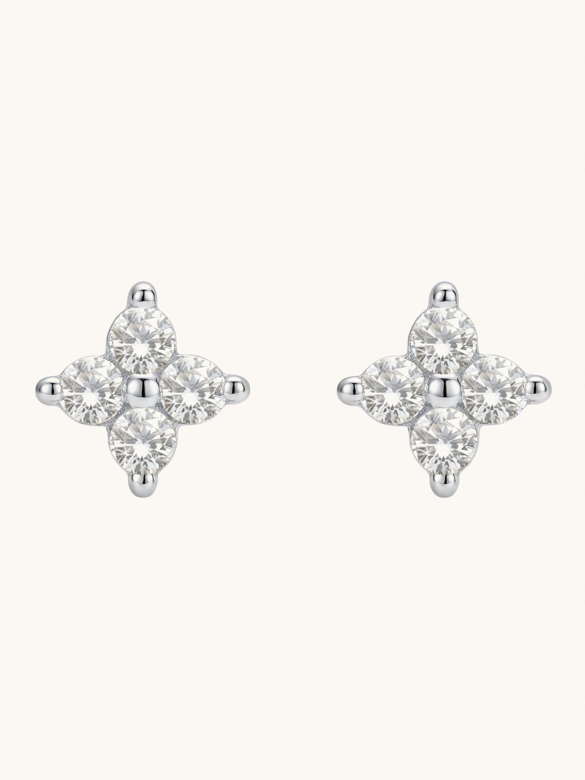 The Jewels Jar Irene star stud earrings in sterling silver with four point cubic zirconia stars