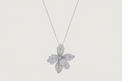 Front View of Orchid Bloom Brooch Pendant in Rhodium-Plated Metal Comfort Fit 925 Sterling Silver Chain Rhodium Plated Brass One Size