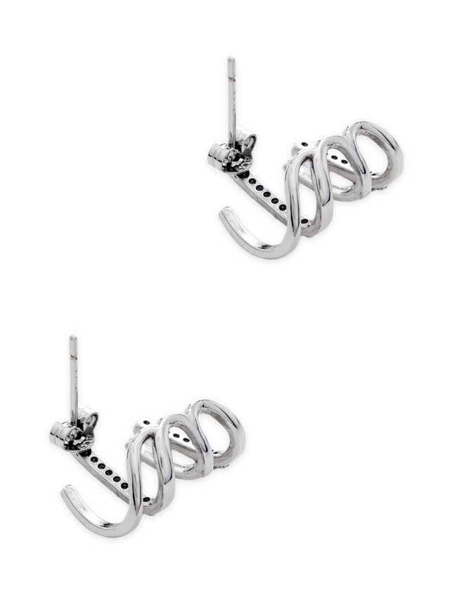 Angled view of the Carla claw earrings showing the sterling silver posts and push backs