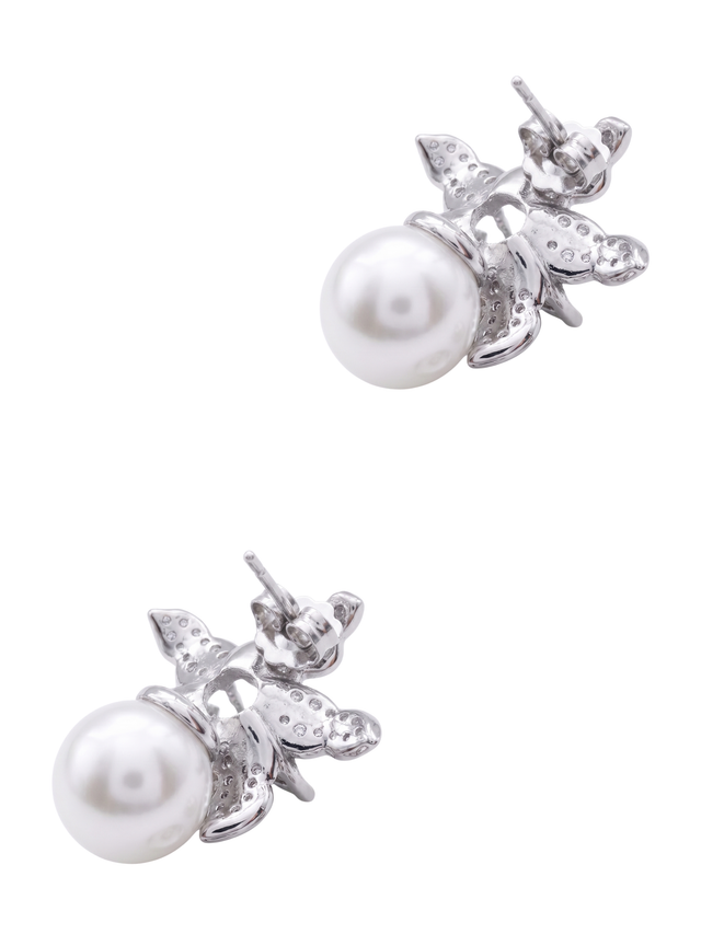 Angled view of the Cattleya pearl earrings showing the shell pearl and sterling silver posts