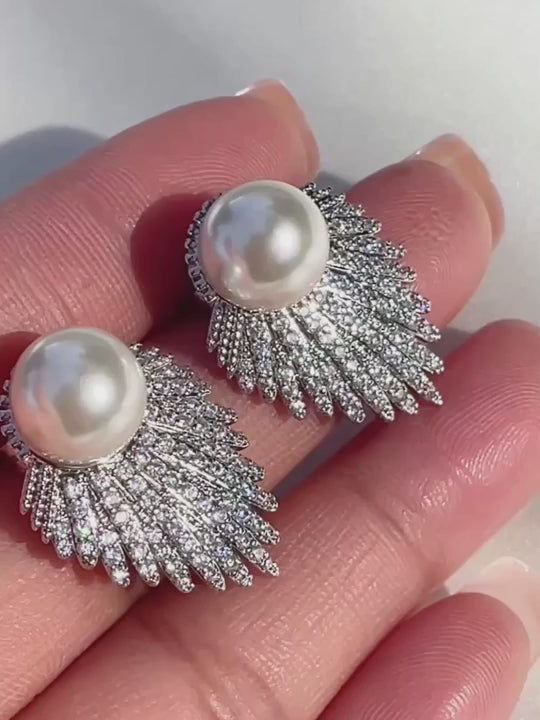 Video of the Evelyn pearl earrings, pearl studs with a pave cubic zirconia fan
