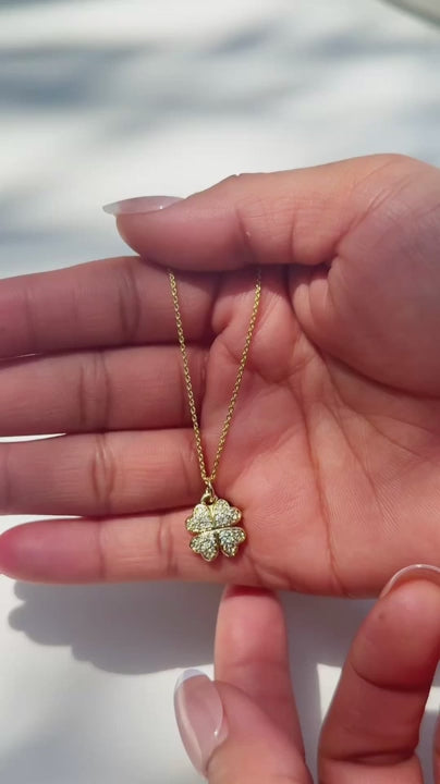 Video of the Cara clover pendant necklace set with a pave four leaf clover and matching studs