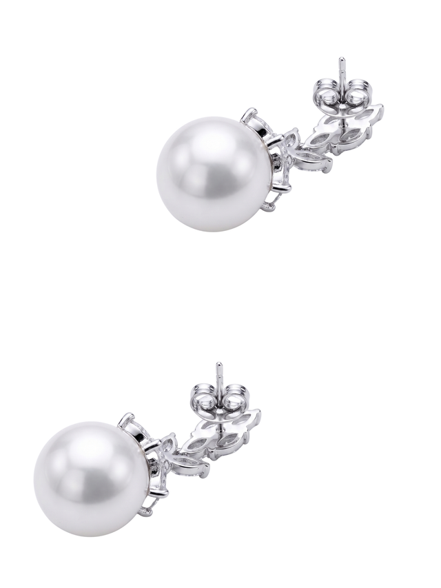 Angled view of the Rania pearl dangle earrings showing the sterling silver posts