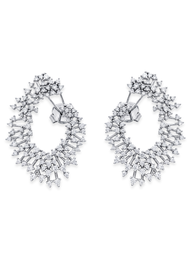 The Jewels Jar Zahra earrings, open swirl statement earrings set with baguette and round cubic zirconia